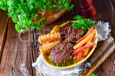 grilled bullets with croquettes and vegetables