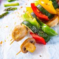 vegetarian skewers white mushrooms, peppers and zucchini for bar
