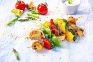 vegetarian skewers white mushrooms, peppers and zucchini for bar