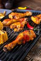 Rustic Grilled chicken wings,legs,and spicy corn