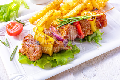 shish kebab skewers with marinated ham meat paprika and red onio