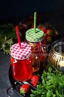 a fruit lemonade with strawberries rhubarb and mint