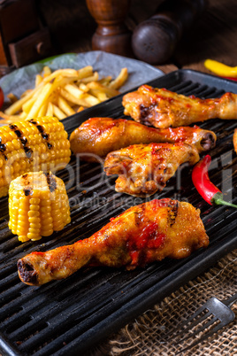 Rustic Grilled chicken wings,legs,and spicy corn