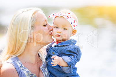 Young Caucasian Mother and Daughter At The Park