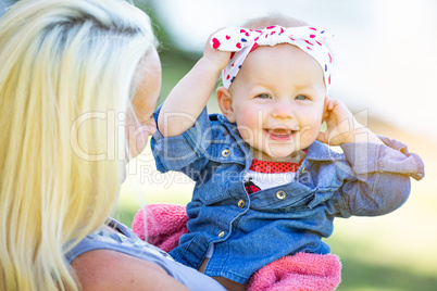 Young Caucasian Mother and Daughter At The Park