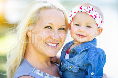 Young Caucasian Mother and Daughter At The Park