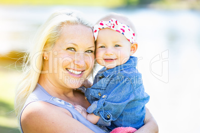 Young Caucasian Mother and Daughter At The Park