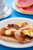 French toast on blue tablecloth