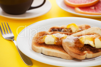 French toast on yellow tablecloth