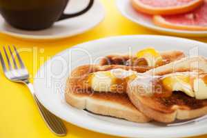 French toast on yellow tablecloth