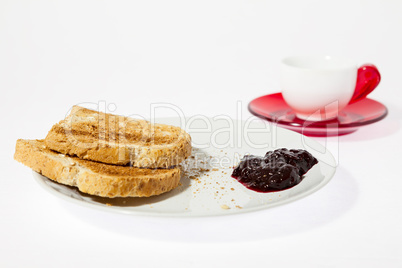 Coffee with jam and bread
