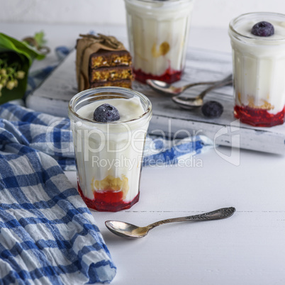 homemade yogurt in  transparent glass