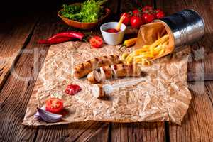 rustic bratwurst with pommes and hot ketchup