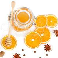 Honey and orange slices isolated on white background. Flat lay,