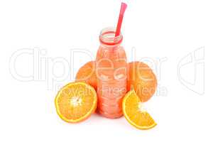 A fruit of orange and a bottle with juice isolated on white back