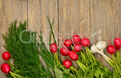 Fresh vegetables on wooden table.