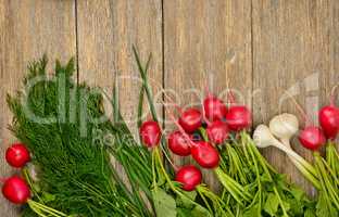 Fresh vegetables on wooden table.