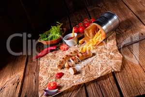 rustic bratwurst with pommes and hot ketchup