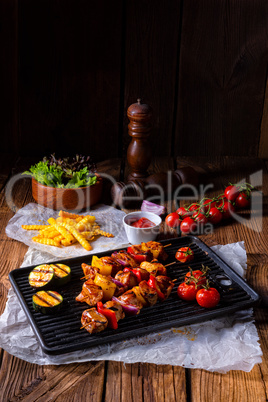 Rustic shish kebab skewers with marinated ham meat paprika and r