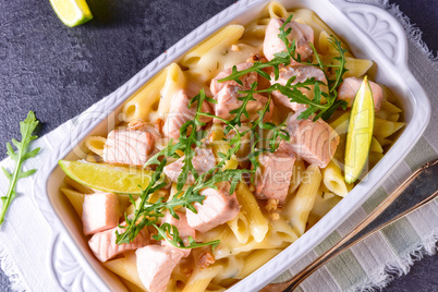 Salmon with penne noodle and arugula