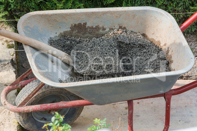 Man is laying paving stones.