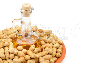 Peanuts and vegetable oils isolated on white background. Free sp