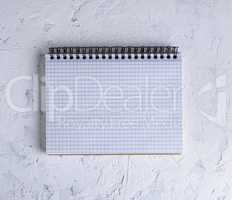 open notebook with blank white sheets