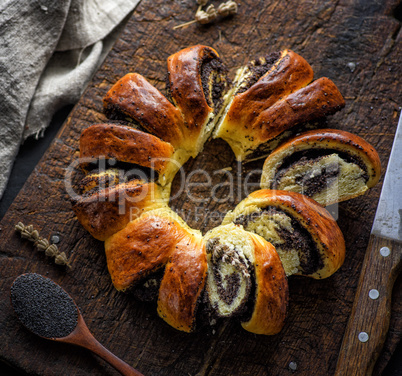 round baked homemade pie with poppy seeds