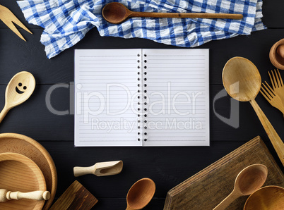 open empty paper notebook with white sheets in a line on a sprin
