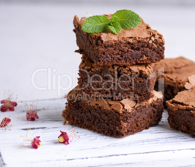 pile of square slices of baked brownie pie