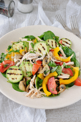 Warm chicken salad with vegetables