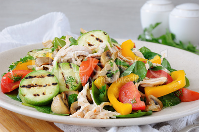 Warm chicken salad with vegetables