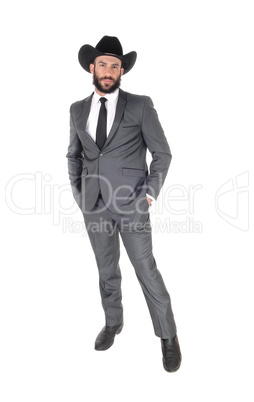 A full body portrait image of a man in s suit