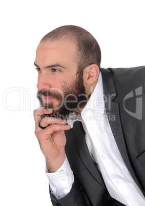 Portrait of businessman with hand on his chin thinking