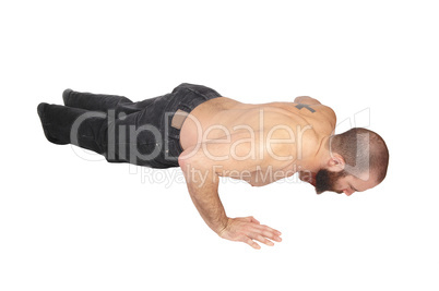 Young man doing punch-ups on the floor
