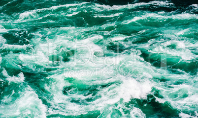 Abstract water currents and rapids in green river