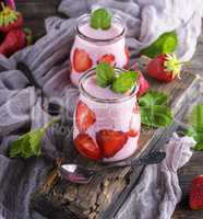 smoothies of fresh strawberries and yogurt in a glass jar