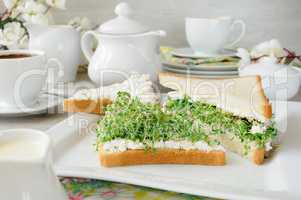 Sandwich with ricotta and alfalfa sprouts