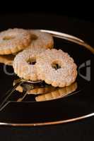Biscuits reflected on a silver plate