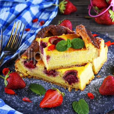 pieces of cheesecake with strawberries