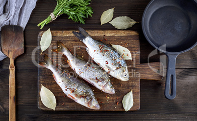river fish on a brown wooden board