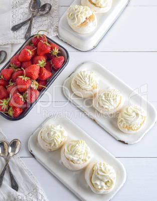 baked meringue with cream and strawberries