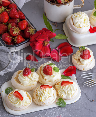 baked meringue with cream and fresh strawberries