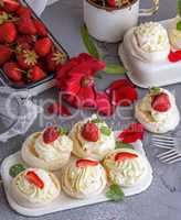 baked meringue with cream and fresh strawberries