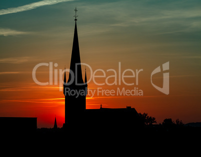 Beautiful Sunset Behind A Church Silhouette And Wonderful Colors