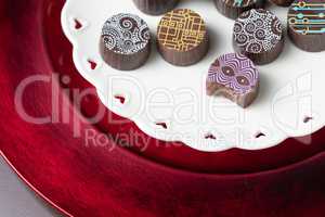 Artisan Fine Chocolate Candy On Serving Dish with Heart Design