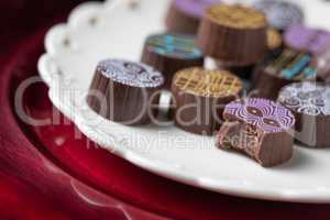 Artisan Fine Chocolate Candy On Serving Dish with Heart Design