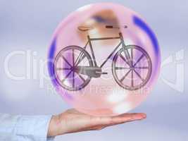 Bicycle in glass ball, 3d illustration