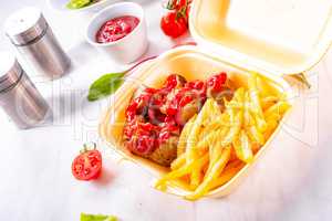 grilled bratwurst with French fries and ketchup