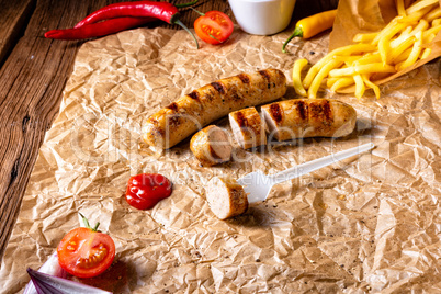 rustic bratwurst with pommes and hot ketchup